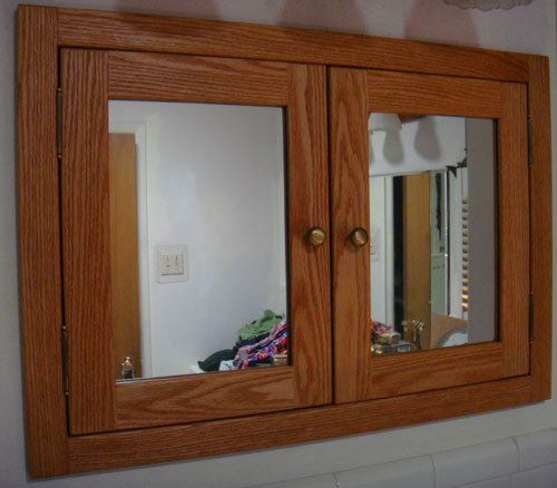 recessed double door medicine cabinet shown in oak