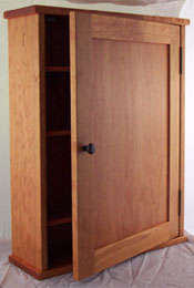 cherry medicine cabinet with paneled door
