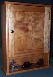 cherry medicine cabinet with open shelf