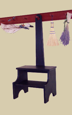step stool hanging on peg rack