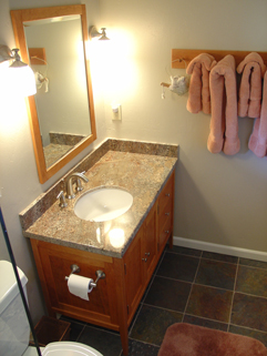 vanity with mirror and pegrack